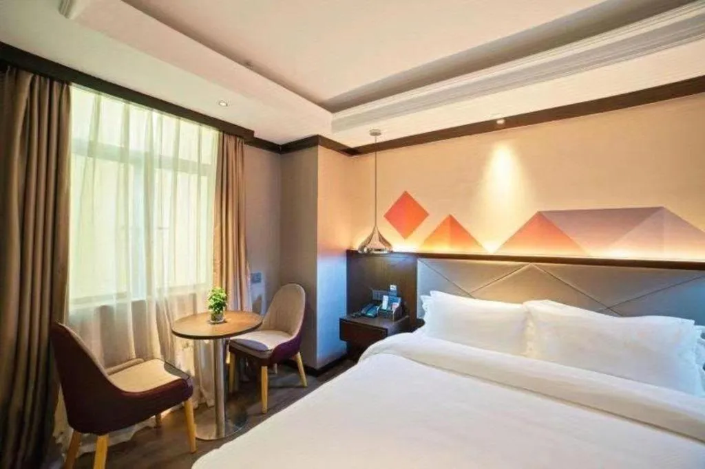 Bed in Borrman Hotel Zhongshan Henglan Xiyong