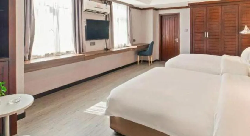 Bed in Borrman Hotel Zhongshan Henglan Xiyong