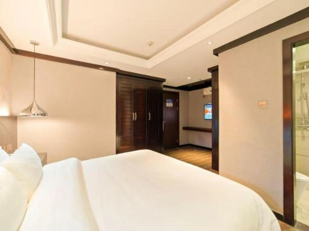 Bed in Borrman Hotel Zhongshan Henglan Xiyong