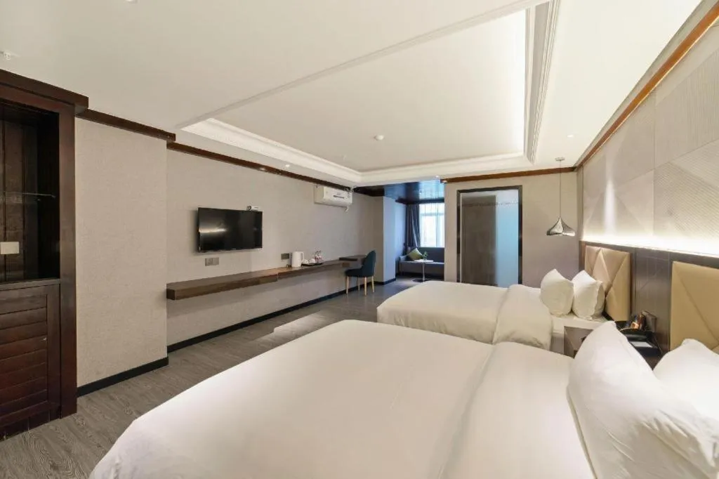 Bed in Borrman Hotel Zhongshan Henglan Xiyong