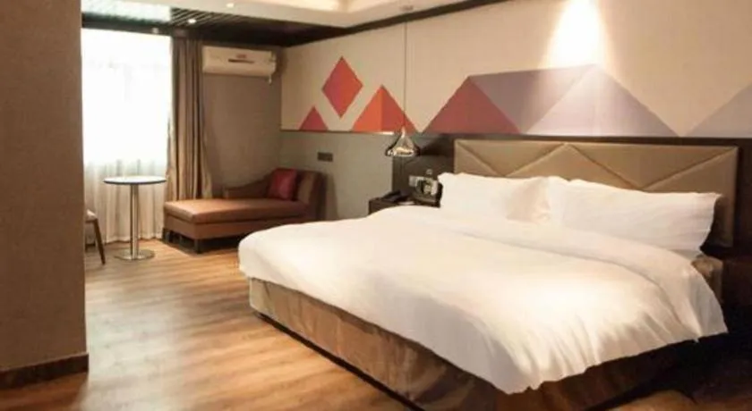 Bed in Borrman Hotel Zhongshan Henglan Xiyong