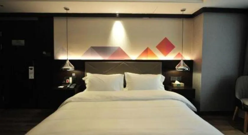 Bed in Borrman Hotel Zhongshan Henglan Xiyong