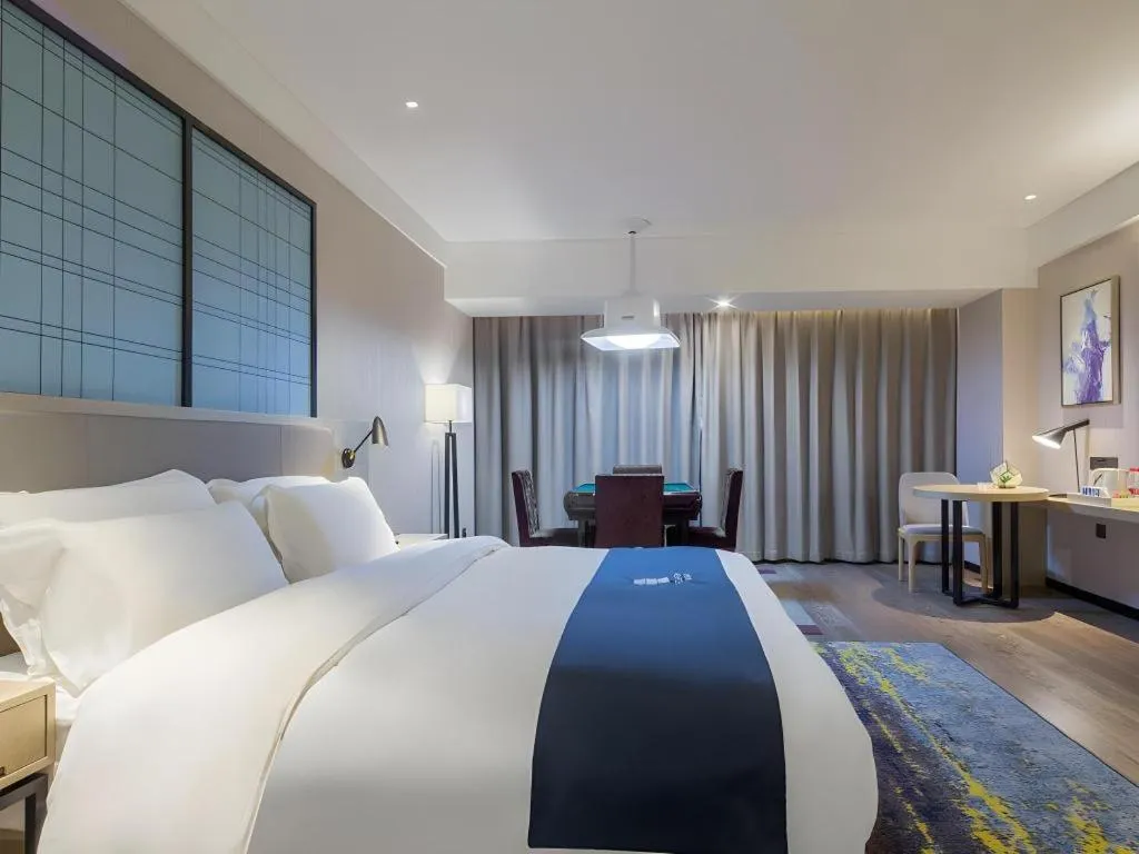 Bed in Echarm Hotel Changsha Xiangya Fushan