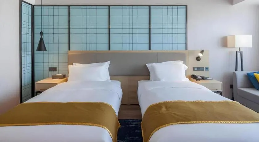Bed in Echarm Hotel Changsha Xiangya Fushan