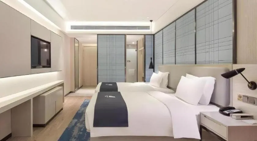 Bed in Echarm Hotel Changsha Xiangya Fushan