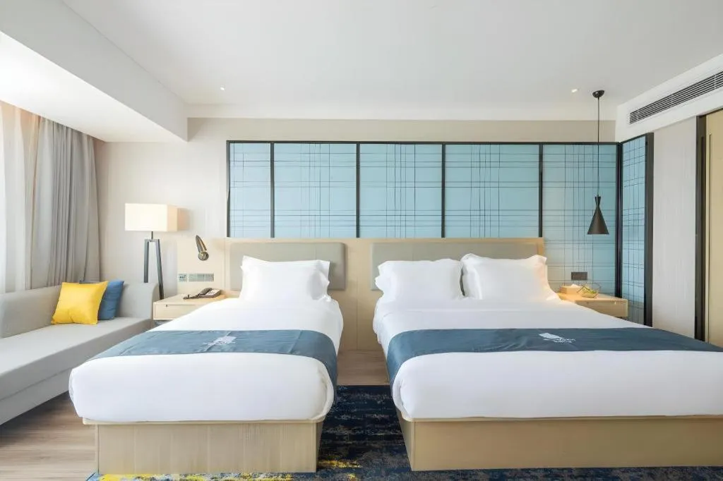Bed in Echarm Hotel Changsha Xiangya Fushan
