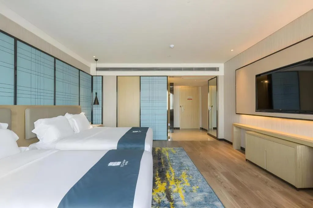 Bed in Echarm Hotel Changsha Xiangya Fushan
