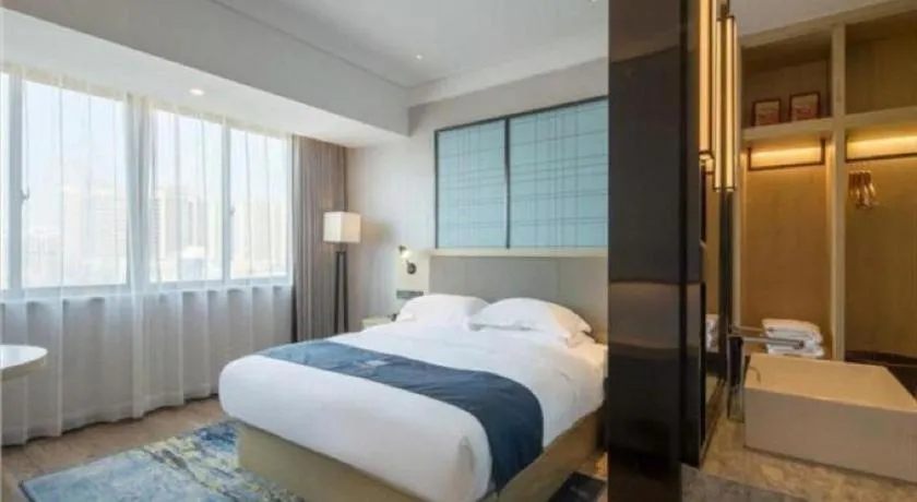 Bed in Echarm Hotel Changsha Xiangya Fushan