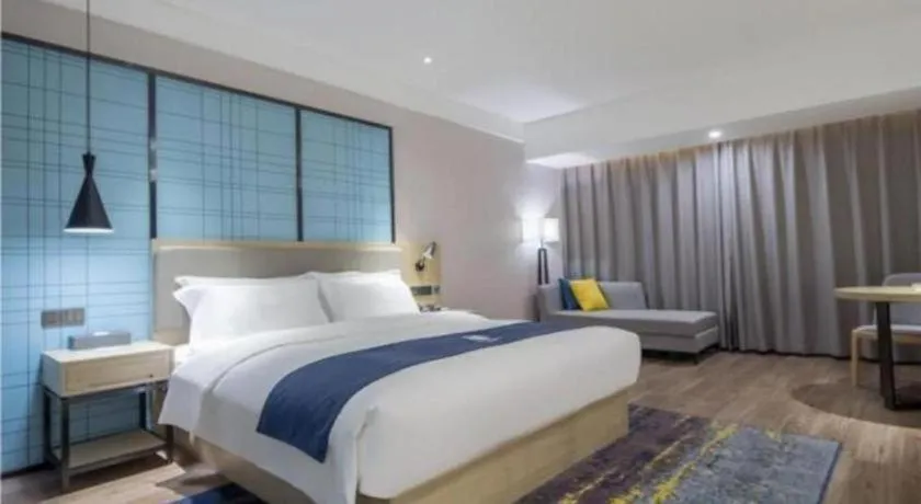 Bed in Echarm Hotel Changsha Xiangya Fushan
