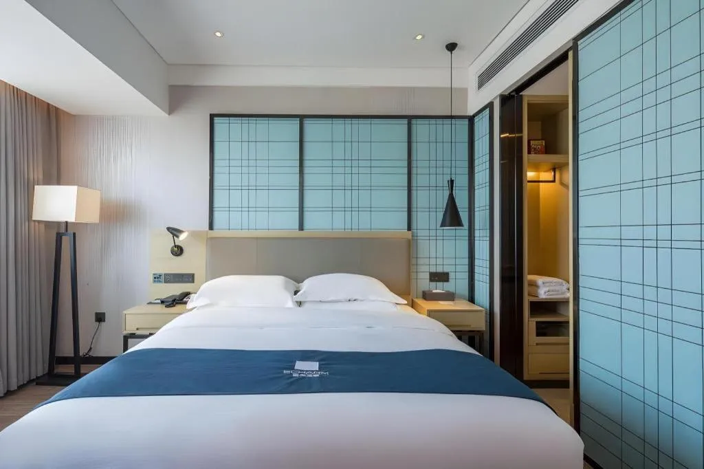 Bed in Echarm Hotel Changsha Xiangya Fushan