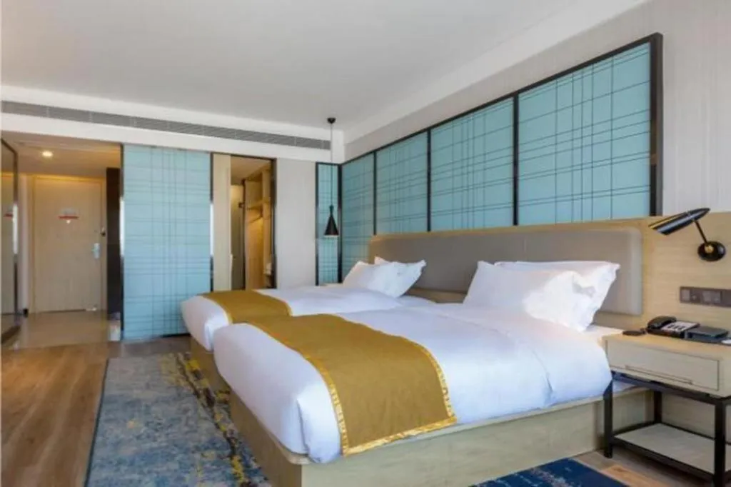 Bed in Echarm Hotel Changsha Xiangya Fushan