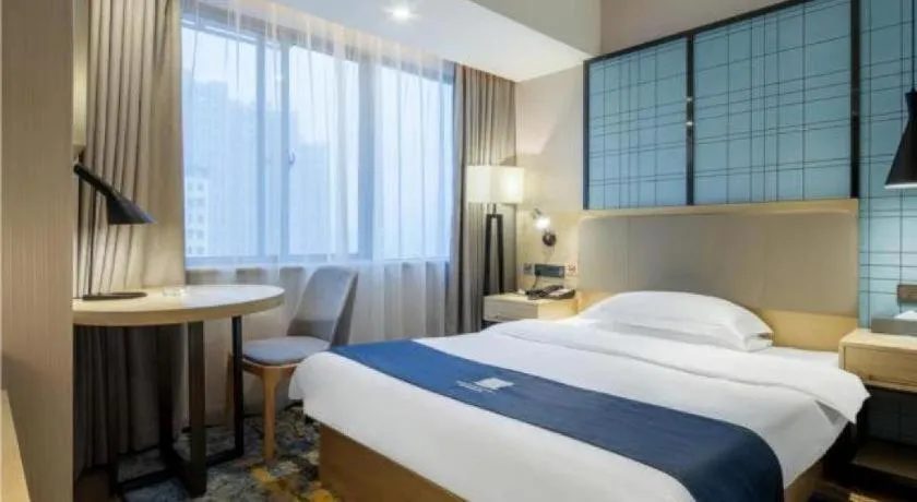 Bed in Echarm Hotel Changsha Xiangya Fushan