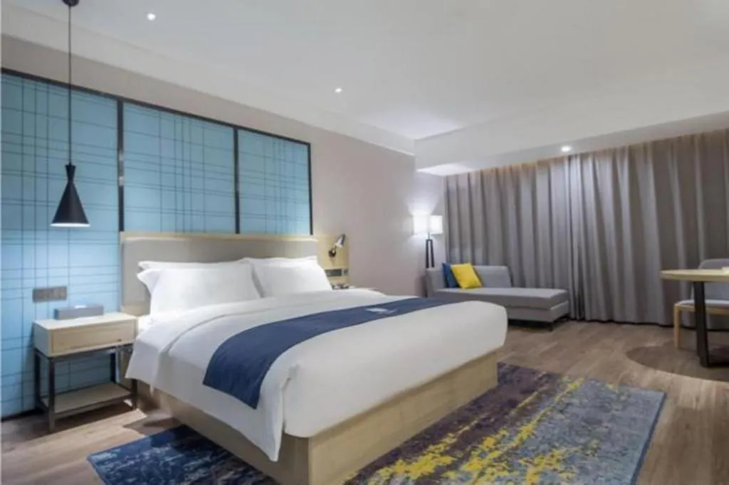 Bed in Echarm Hotel Changsha Xiangya Fushan