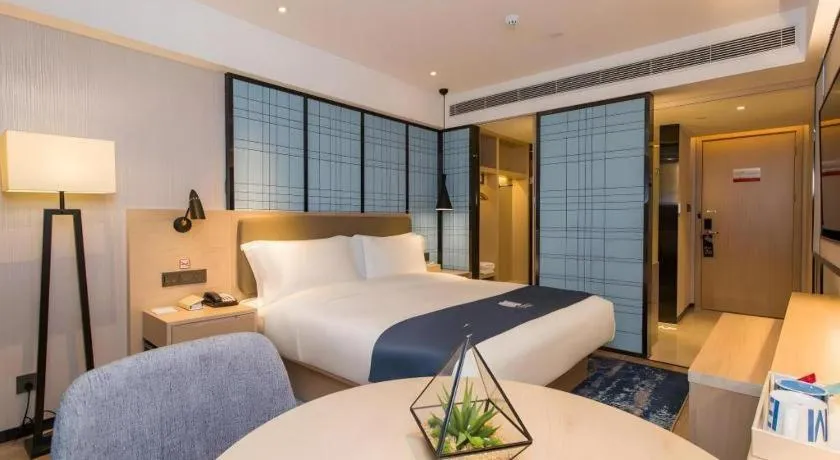 Bed in Echarm Hotel Changsha Xiangya Fushan