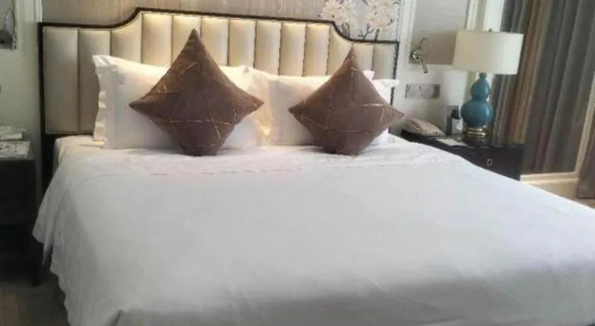 Bed in Ming Guan Hotel