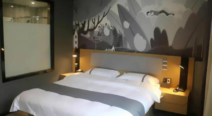 Bed in Thank Inn Hotel Anqing Guangcai Big Market Passenger Center