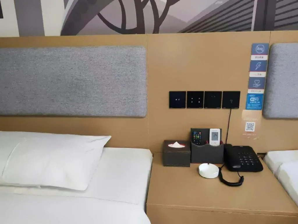 Bed in Thank Inn Hotel Anqing Guangcai Big Market Passenger Center