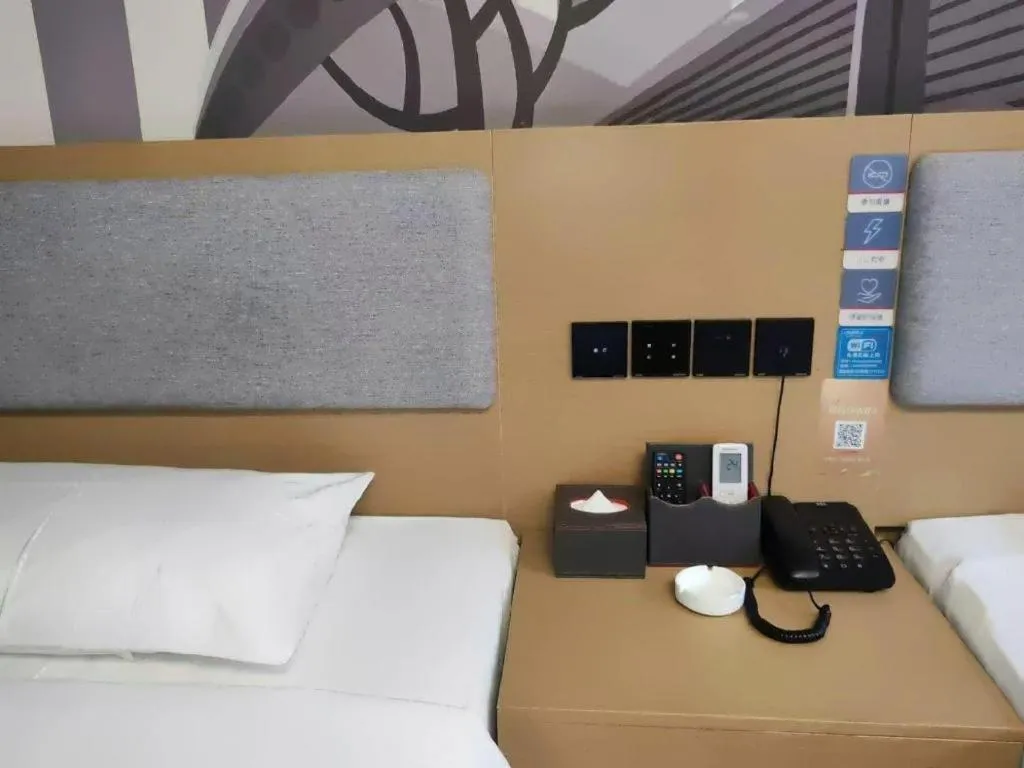 Bed in Thank Inn Hotel Anqing Guangcai Big Market Passenger Center