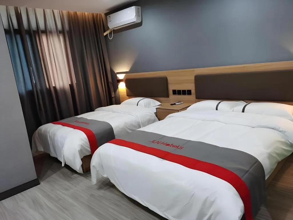 Bed in Jun Hotel Henan Sanmenxia Dennis Plaza