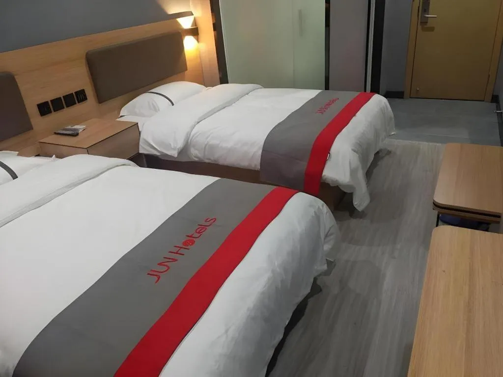 Bed in Jun Hotel Henan Sanmenxia Dennis Plaza