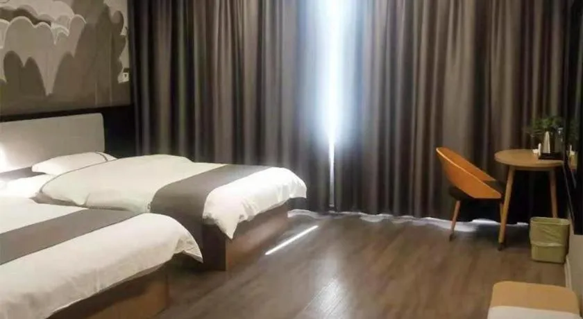 Bed in Thank Inn Hotel Guangxi Hechi Yizhou Sankeshu