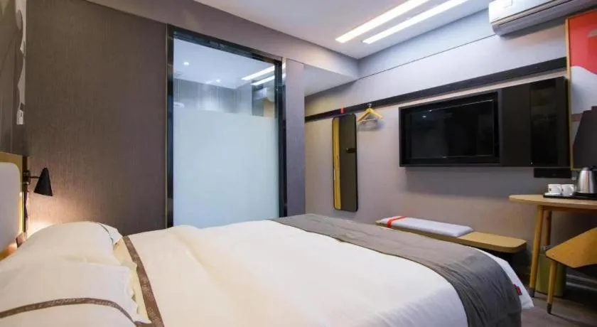 Bed in Thank Inn Hotel Guangxi Hechi Yizhou Sankeshu