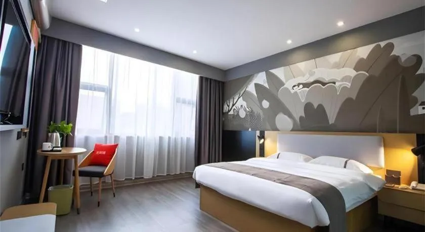 Bed in Thank Inn Hotel Guangxi Hechi Yizhou Sankeshu