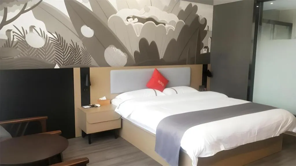 Bed in Thank Inn Hotel Guangxi Hechi Yizhou Sankeshu