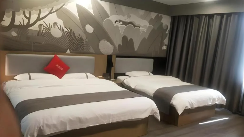 Bed in Thank Inn Hotel Guangxi Hechi Yizhou Sankeshu