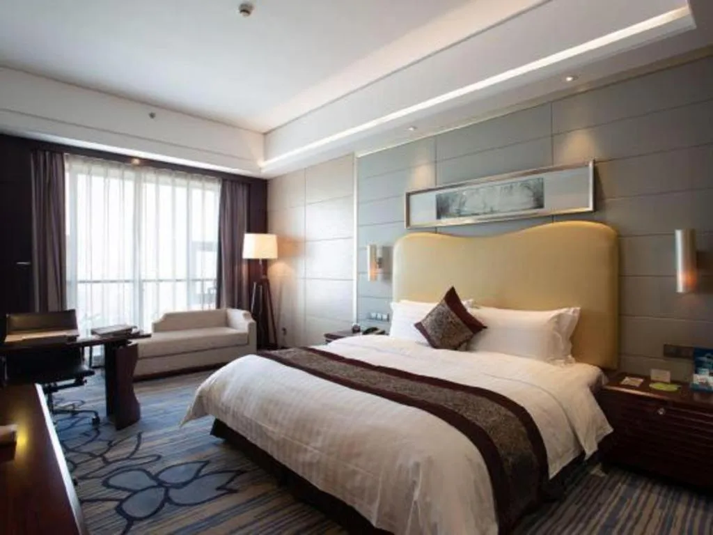 Bed in Bairun Zhenjiang International Hotel