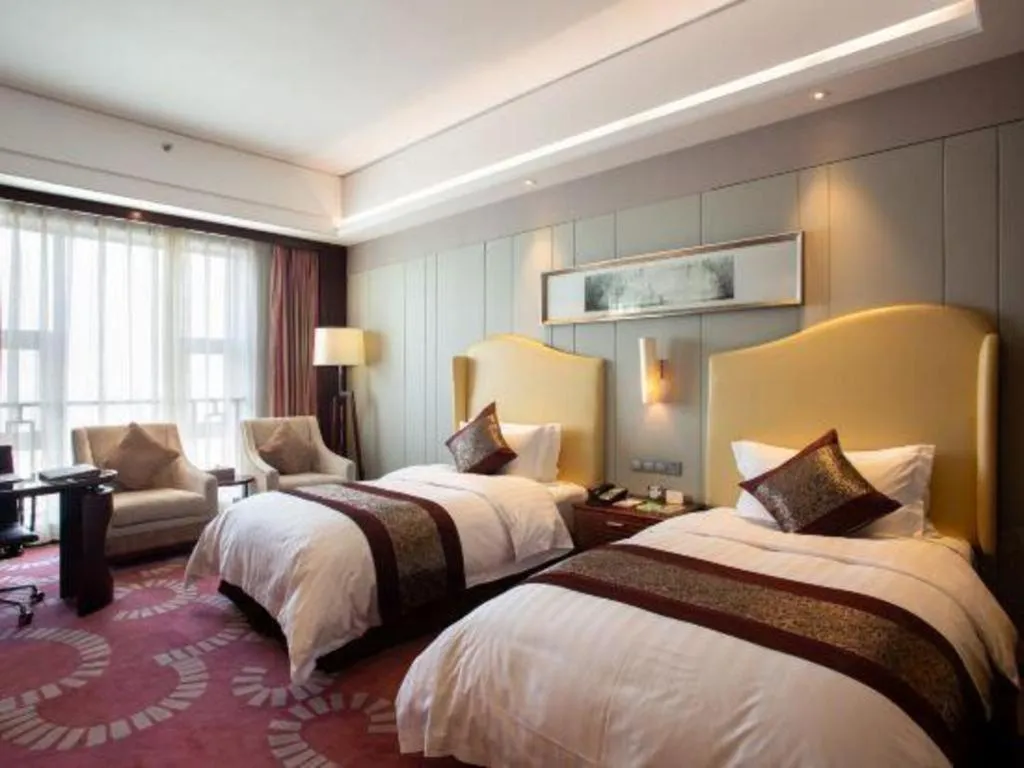 Bed in Bairun Zhenjiang International Hotel