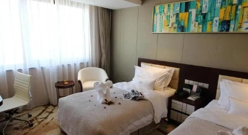 Bed in Xingtai Yuehai Hotel