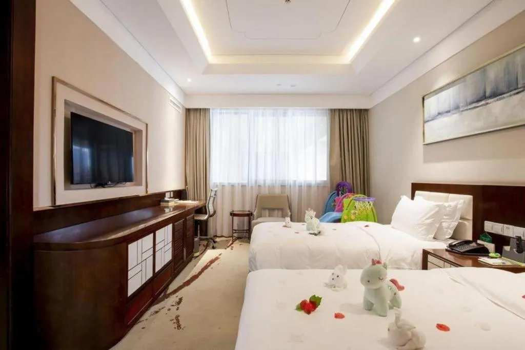 Bed in Xingtai Yuehai Hotel