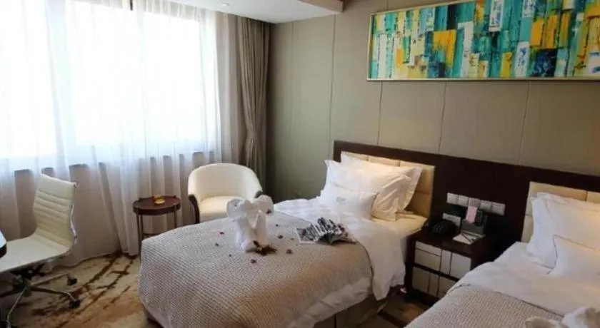 Bed in Xingtai Yuehai Hotel