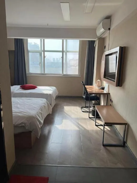 Bed in Thank Inn Hotel Shandong Heze Mudan District Bayi Road Pedestrian Street