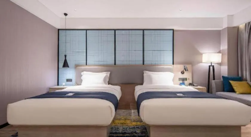 Bed in Echarm Hotel Nanning Wuming