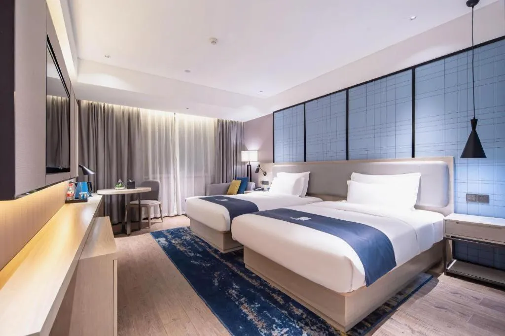 Bed in Echarm Hotel Nanning Wuming