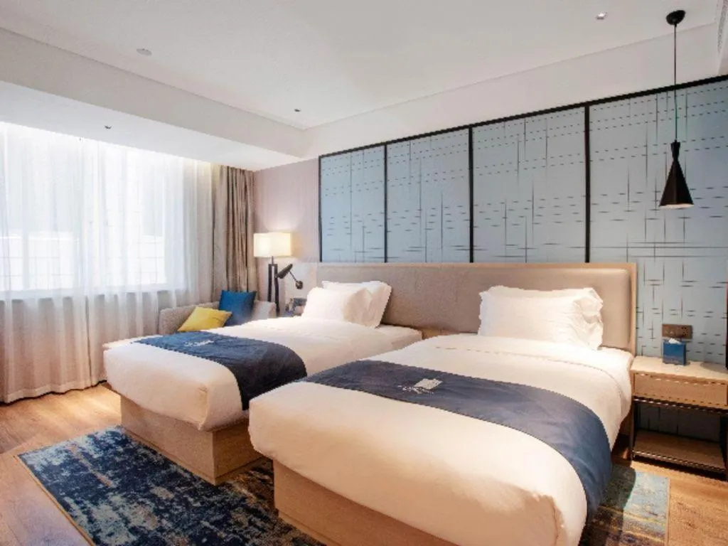 Bed in Echarm Hotel Nanning Wuming