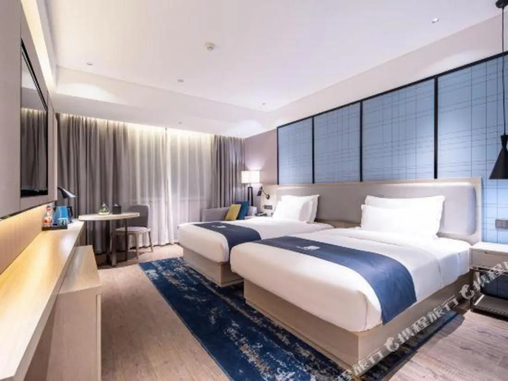 Bed in Echarm Hotel Nanning Wuming