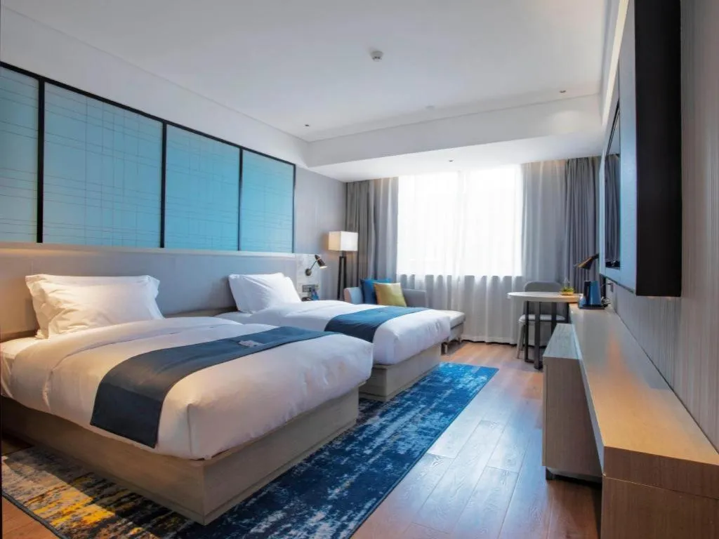 Bed in Echarm Hotel Nanning Wuming