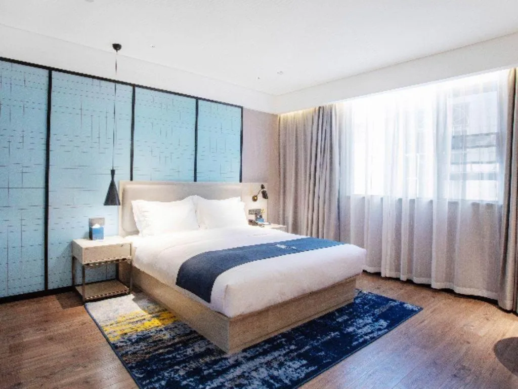 Bed in Echarm Hotel Nanning Wuming