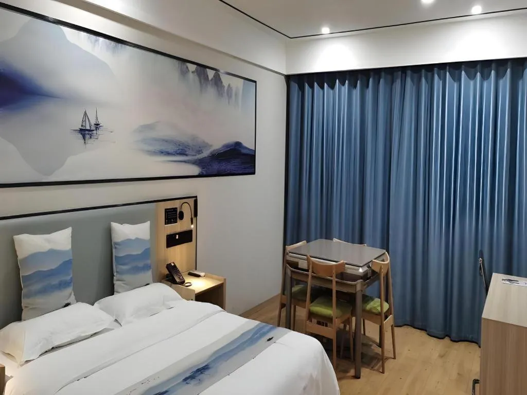 Bed in Green Tree Inn Express Jiangsu Taizhou Xinghua RT-Mart