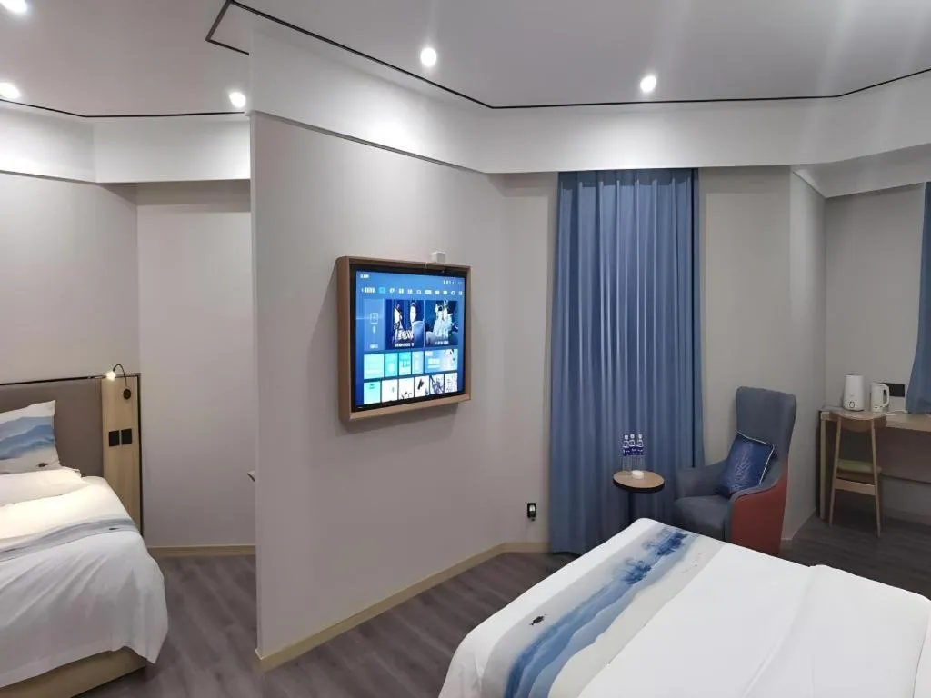 Bed in Green Tree Inn Express Jiangsu Taizhou Xinghua RT-Mart