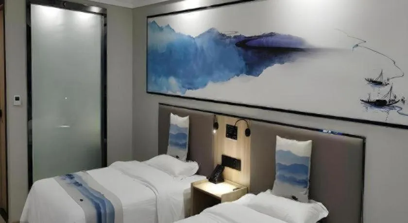 Bed in Green Tree Inn Express Jiangsu Taizhou Xinghua RT-Mart