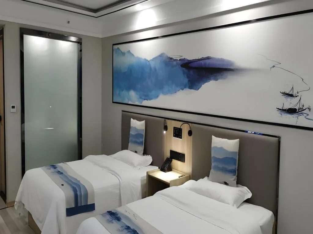 Bed in Green Tree Inn Express Jiangsu Taizhou Xinghua RT-Mart