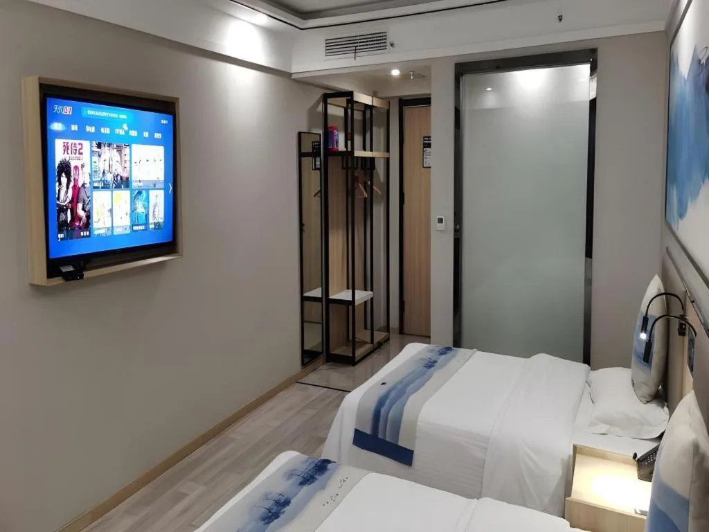Bed in Green Tree Inn Express Jiangsu Taizhou Xinghua RT-Mart