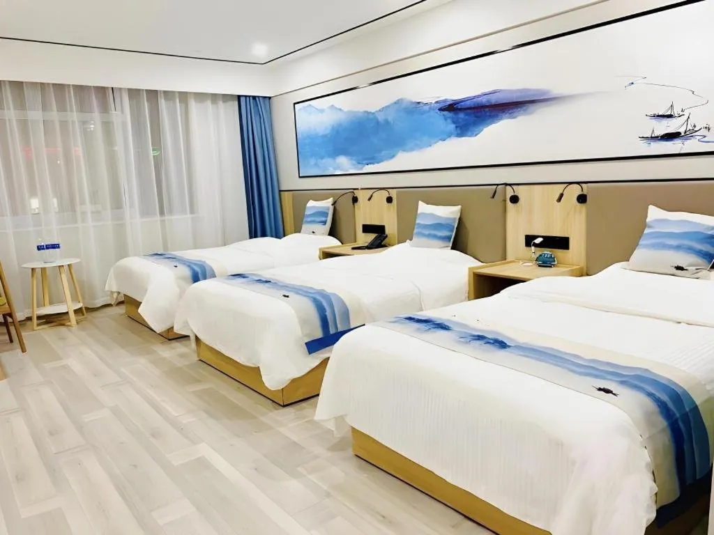 Bed in Green Tree Inn Express Jiangsu Taizhou Xinghua RT-Mart