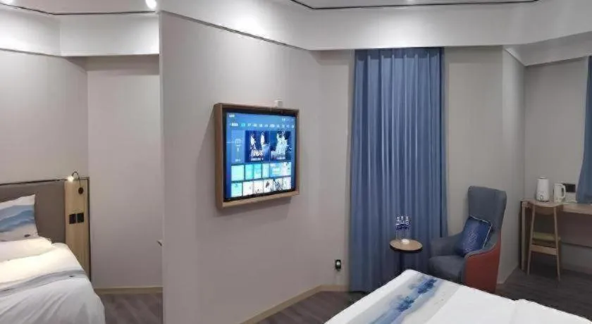 Bed in Green Tree Inn Express Jiangsu Taizhou Xinghua RT-Mart