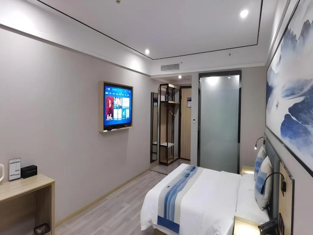 Bed in Green Tree Inn Express Jiangsu Taizhou Xinghua RT-Mart