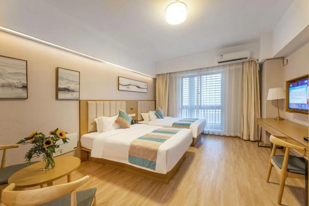 Bed in VX Hotel Wuxi Xinwu District Executive Center Wanda Plaza